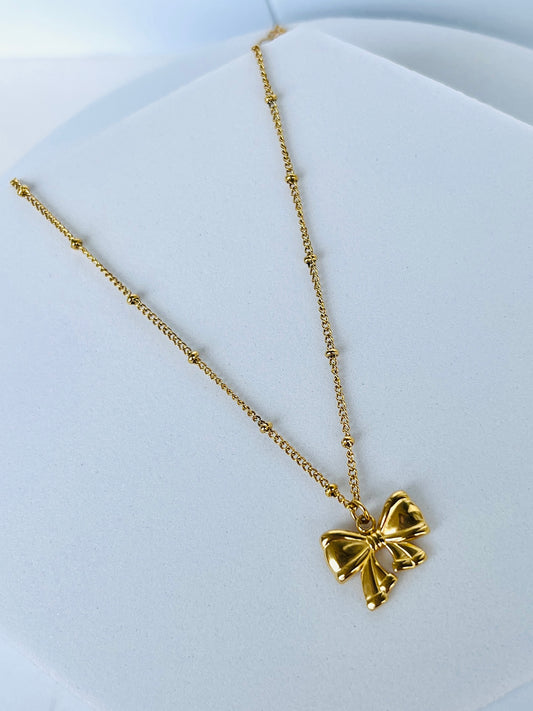 Golden Bow Pendant Necklace