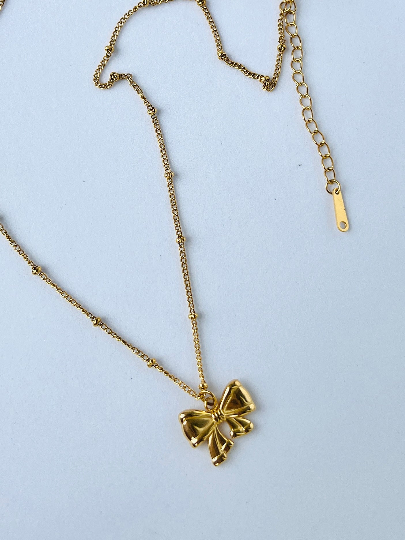 Golden Bow Pendant Necklace